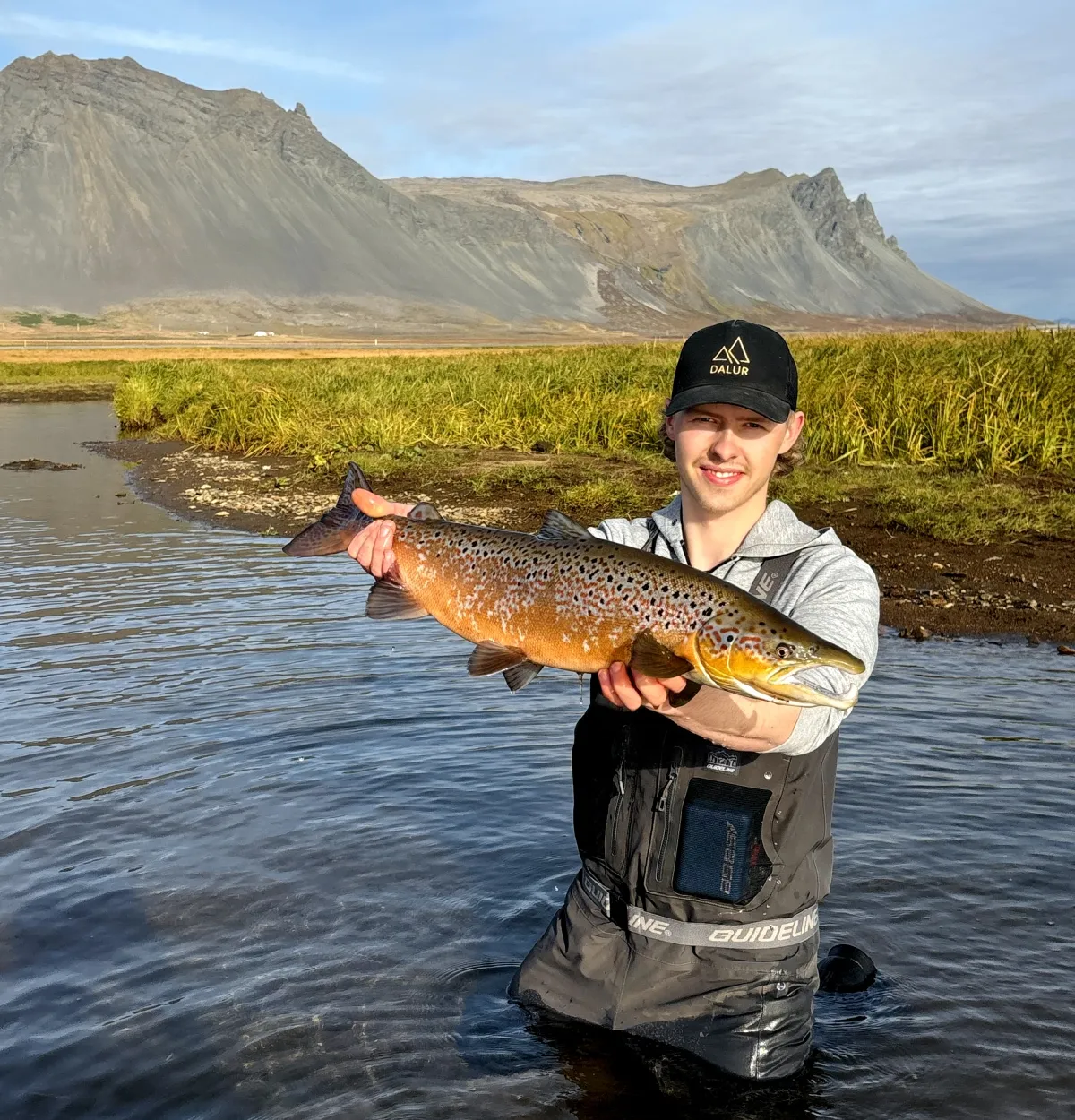 Magnús holding a Salmon in September